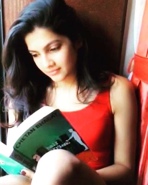 Ashrita Shetty reading a book