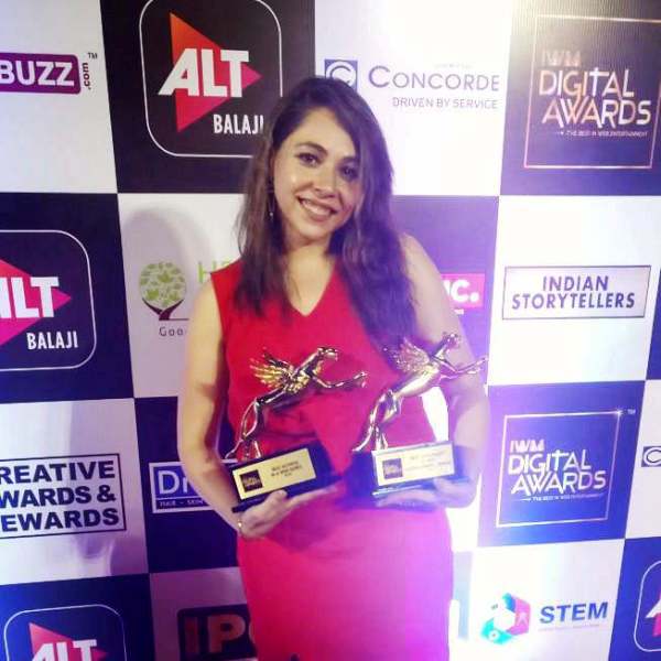 Maanvi Gagroo Posing with Her Awards