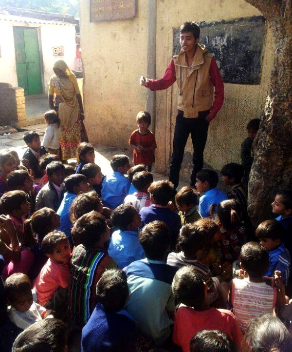Safin Hasan teaching slum children