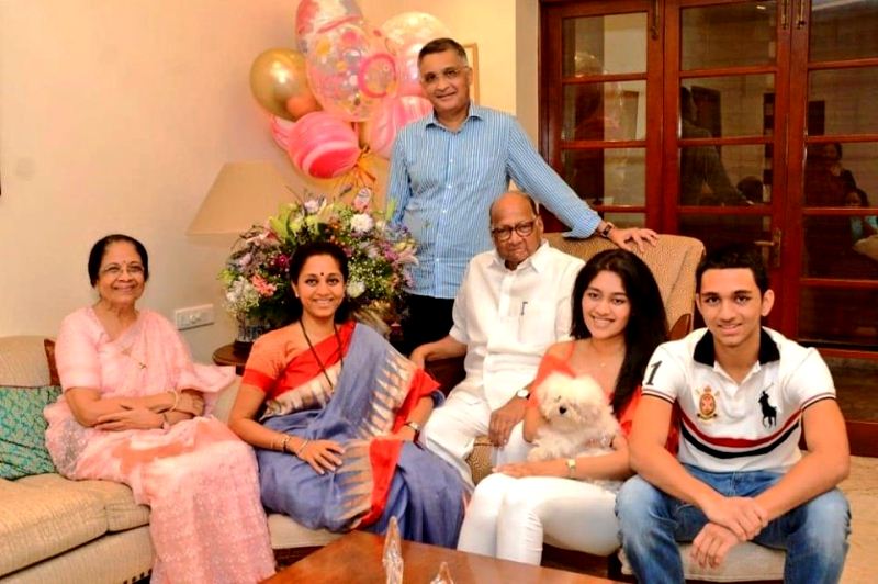 Supriya Sule with her father Sharad Pawar (centre), mother Pratibha Sule (extreme left), husband Sadanand Sule (top), daughter Revati Sule, and son Vijay Sule (extreme right)