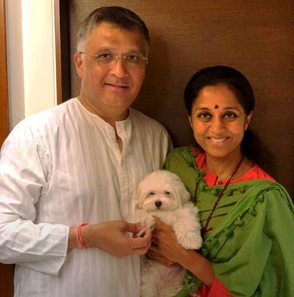 Supriya Sule with her husband Sadanand Sule and their dog