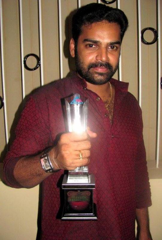 Pradeep Chandran with his Award