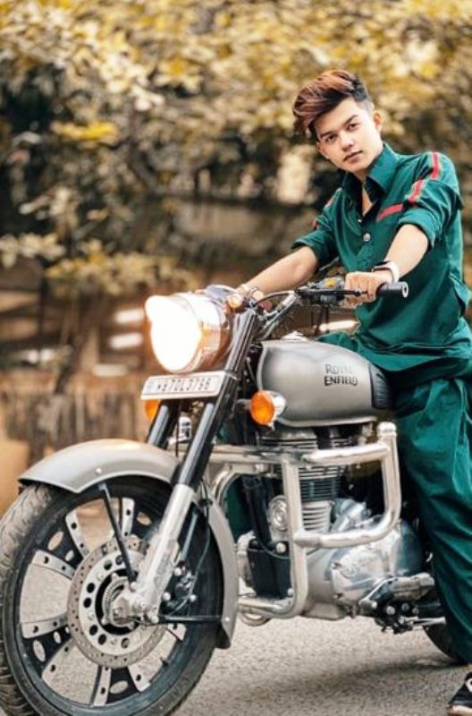 Riyaz Aly Posing on His Bike