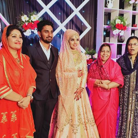 Thesni Khan with her family