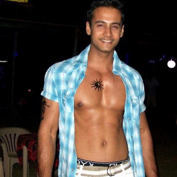 Yash Dasgupta's posing with his tattoos