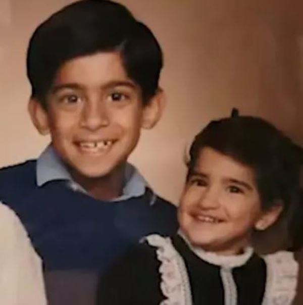 A childhood image of Rishi Sunak with his younger sister