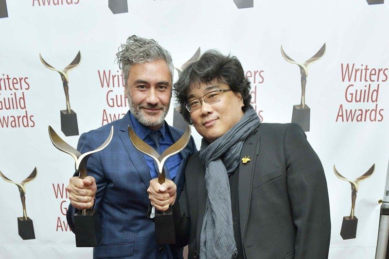 Bong Joon-ho with his Writers Guild of America Awards