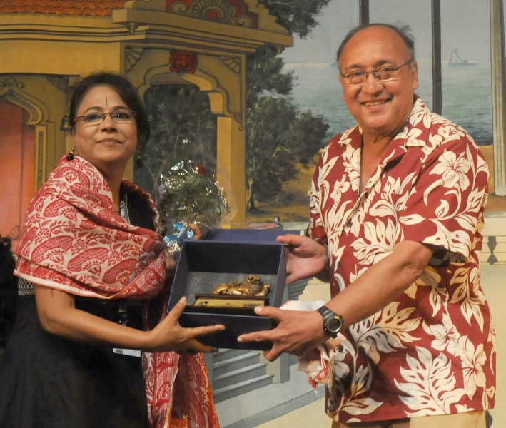 The International Jury Member Victor Banerjee felicitating the Assamese Film Actress Seema Biswas, at the Closing Ceremony of the North East Films, during the 44th International Film Festival of India