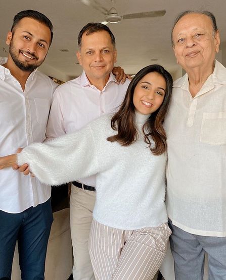 Masoom Minawala Mehta with her grandfather, father, and brother
