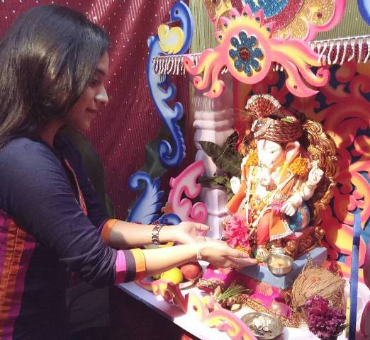 Rutuja Junnarkar with the idol of Lord Ganesha