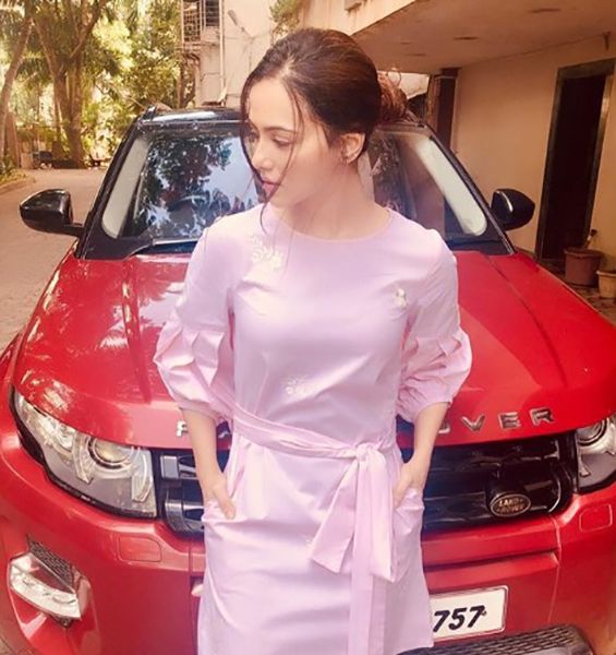 Sana Khan Posing with her Car