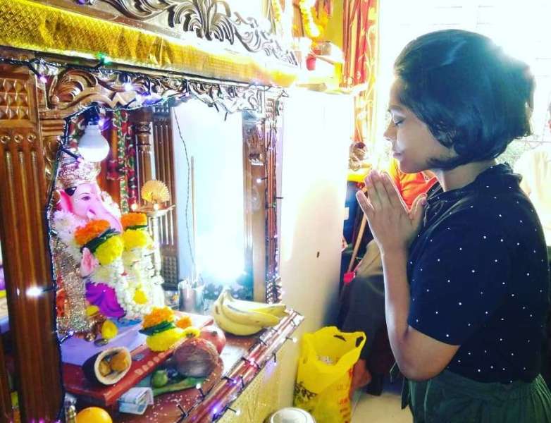 Sonal Vichare praying to Lord Ganesha