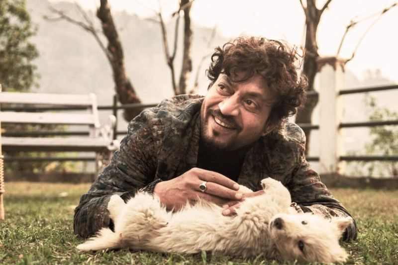 Irrfan Khan Playing With a Dog