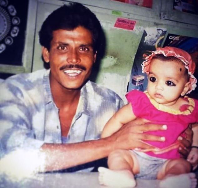 A Childhood Picture of Aasif Khan With His Father