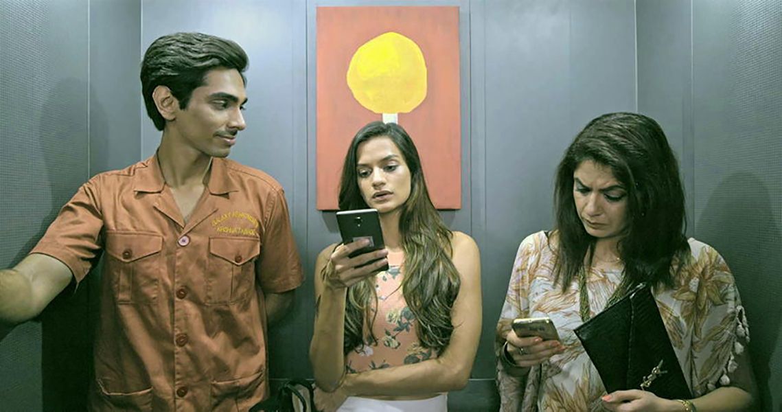 Aneesha Shah in a Scene from 'The Lift Boy' (2019)
