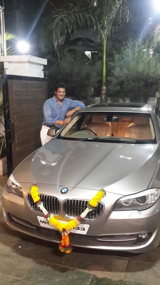 Mahendra Murlidhar Ghule with his BMW