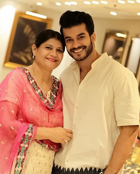 Varun Verma and his mother