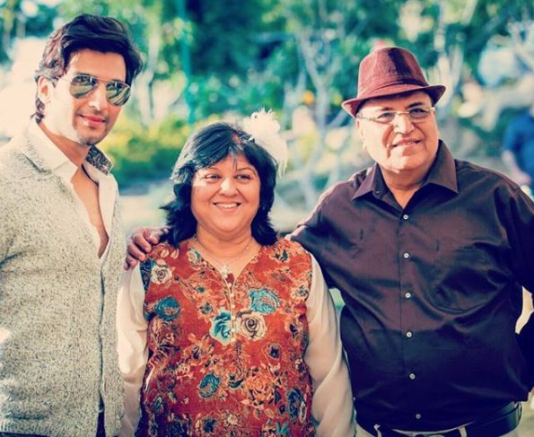 Manish Raisinghan and his parents