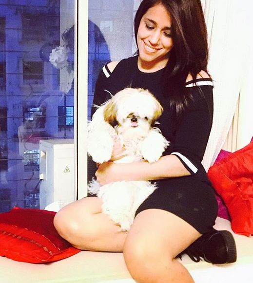 Taranjit Kaur with her pet dog