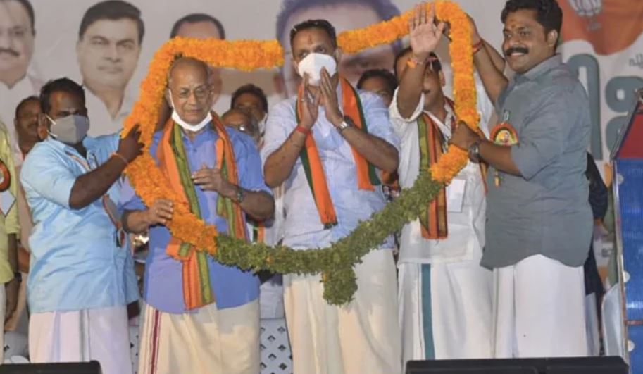 Metro Man E Sreedharan, along with Kerala BJP chief K Surendran, being garlanded after he formally joined the Bharatiya Janata Party