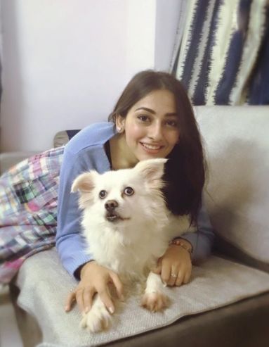 Anagha Bhosale with her pet dog