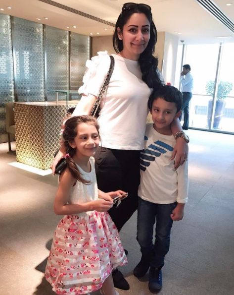 Iqra Dutt with her brother and mother