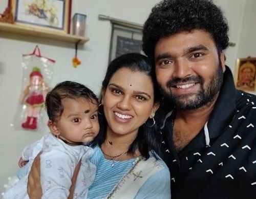 Raghu and His Wife and Daughter