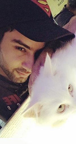 Sahil Uppal with a Persian cat