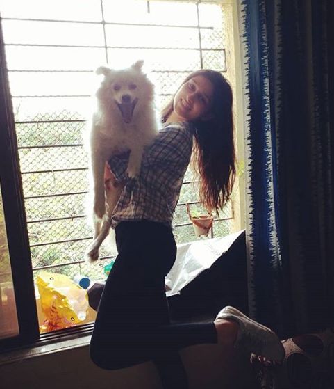 Sheen Dass with her pet dog