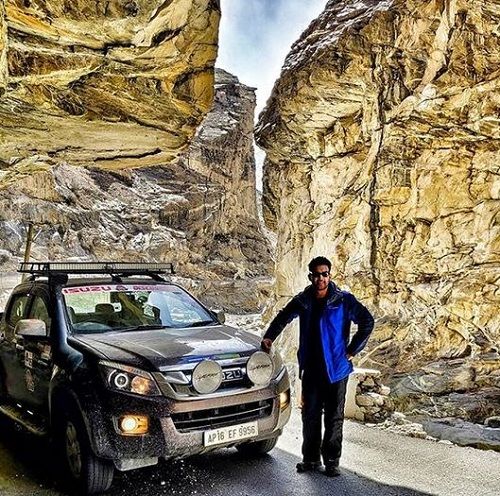 Abijeet Duddala Posing With His Jeep
