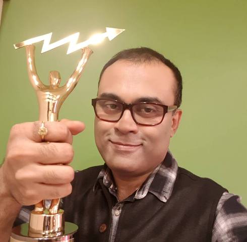 Amitabh Bhattacharya with an award
