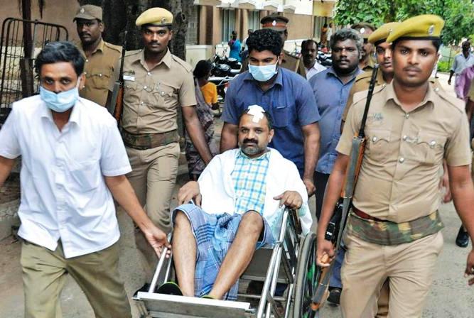 Perarivalan being taken to a government medical hospital after he was attacked by one of the prisoners