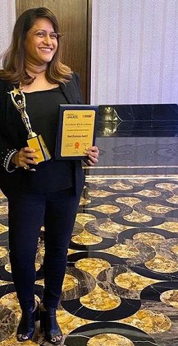 Rohini Iyer Holding Her Award