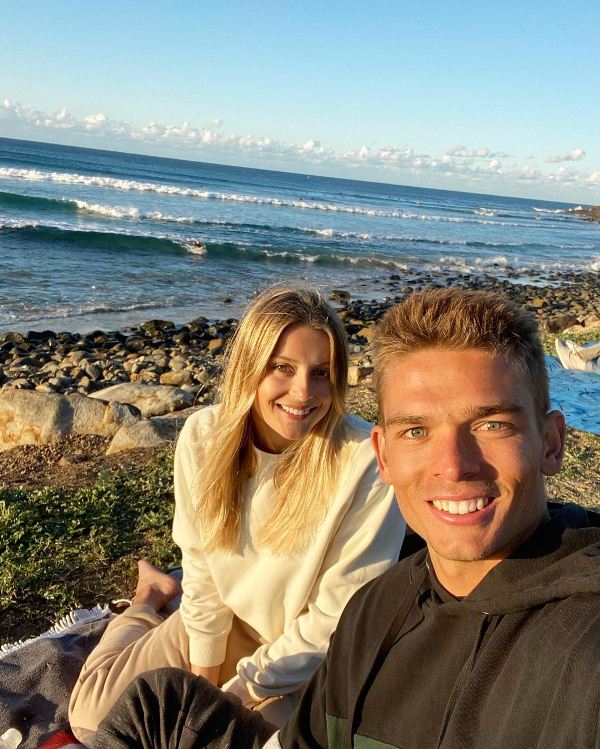 Chris Green with his girlfriend Bella Wagschall at the beach