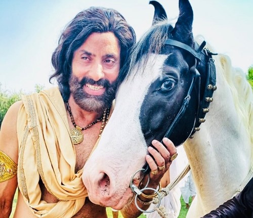 Shaji Choudhary with a horse