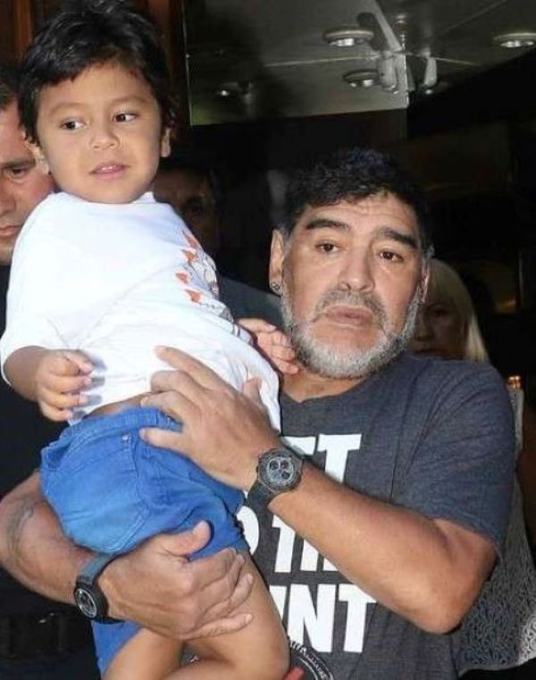 Giannina Maradona's half brother Diego Fernando with Diego Maradona