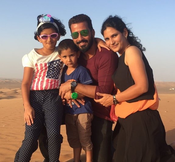 Jithan Ramesh with his wife and children