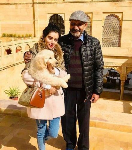 Sukirti Kandpal with her Father and her Pet Dog