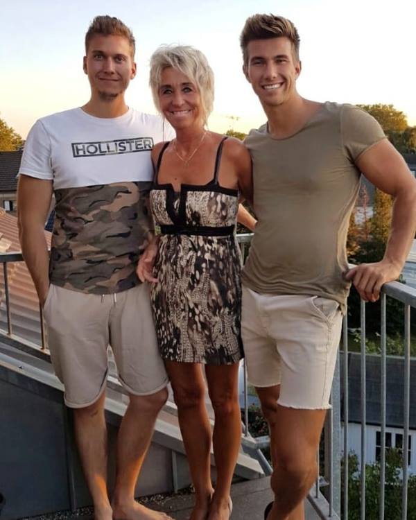 Christian Betzmann with his mother and brother