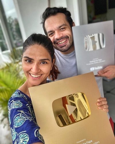 Gaurav Taneja with his Wife Holding YouTube Play Buttons