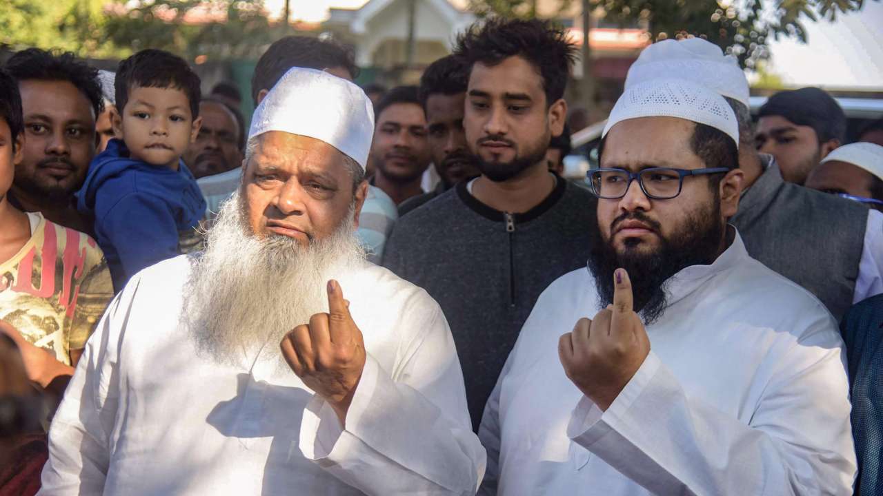 Maulana Badruddin Ajmal with his son Maulana Abdur Rahim Ajmal after casting votes in Assam panchayat election 2018