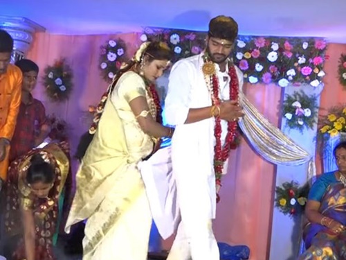 Swathi Naidu with her husband Avinash during their wedding