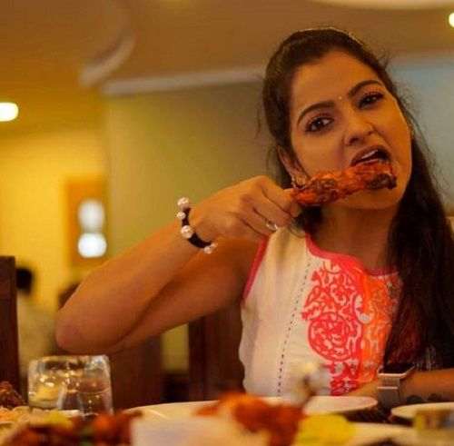VJ Chitra Eating in a Restaurant