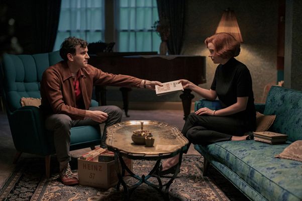 Beth Harmon (played by Anya Taylor-Joy) with Harry Beltik (played by Harry Melling) in a scene from The Queen's Gambit (2020)