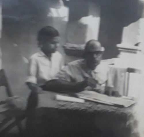 Childhood picture of H. C. Verma with his father