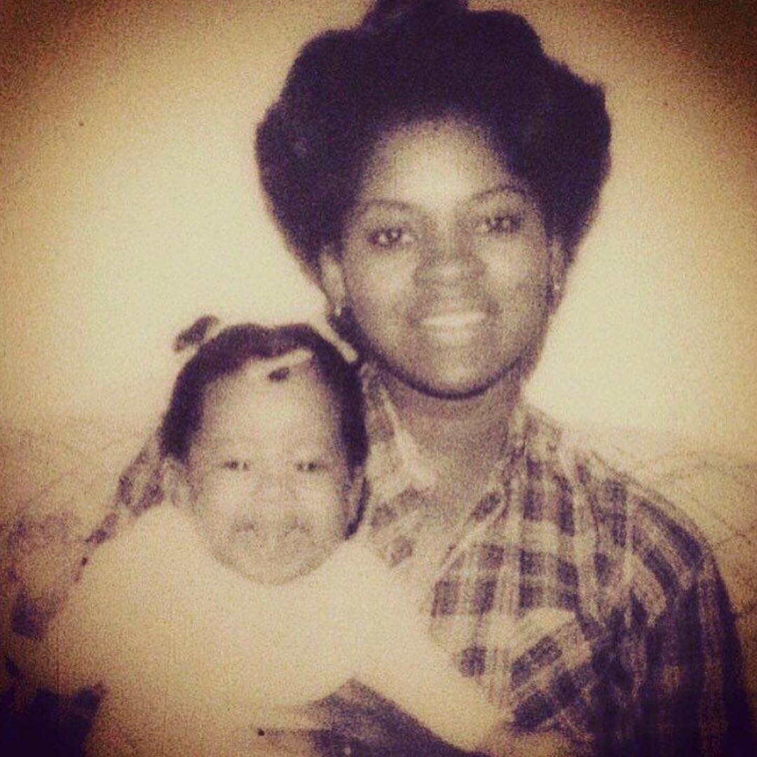 Childhood picture of Phoebe Robinson with her mother