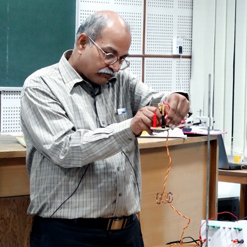 H. C. Verma giving a demonstration on a concept of Physics