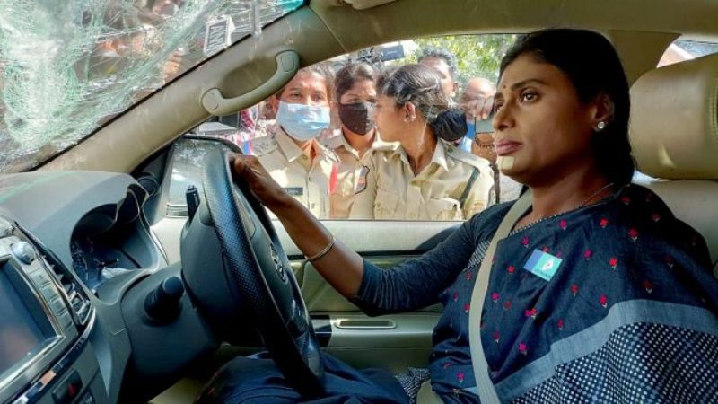 A picture of Y. S. Sharmila inside her car as it was dragged away with the help of a crane, while she protests against Telangana's first Chief Minister K Chandrashekhar Rao, in Hyderabad