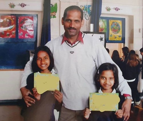 Amita Suman (right) with her father and elder sister