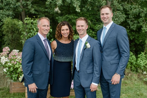 Calahan Skogman (right) with his parents and brother